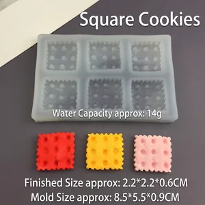 Detailed view of 6-cavity square silicone mold for heart and star shaped DIY cookies