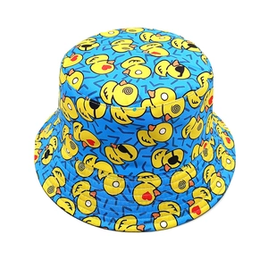 Bright blue cotton bucket hat featuring all-over yellow cartoon duck prints with sunglasses