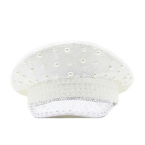 Detail of white captain hat with shimmering sequins, pearls, and rhinestone trim