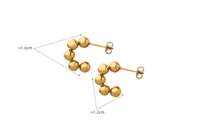 Detailed macro view showing the 1.6cm dimensions of golden steel ball C-hoop earrings