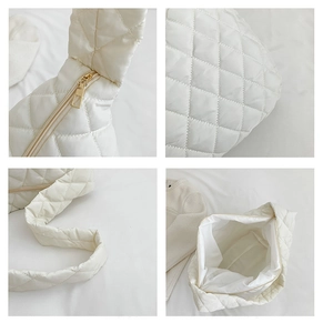 Detailed views of white quilted puffer tote with gold zipper and spacious interior