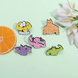Creative fitness animal enamel pins set featuring muscle cat frog and bee on green background