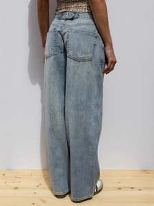 High waist wide leg jeans in light blue denim with back waist adjustment buckle detail