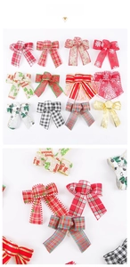 Detailed view of 12 festive 5cm Christmas ribbon bows with plaid and snowflake patterns