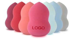 Close-up of multi-colored teardrop makeup sponges with a focus on smooth sponge texture