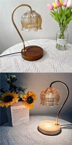 Detail view of vintage melting wax lamp with ribbed amber glass shade and wood base