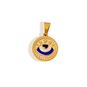 Detailed close-up of golden evil eye pendant with blue and white enamel and rope texture