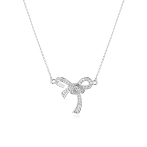 Macro view of bow pendant necklace with sparkling cubic zirconia on 18k gold plated chain