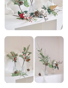 Detail view of artificial pine needles, red berries, and pine cones for Christmas decor