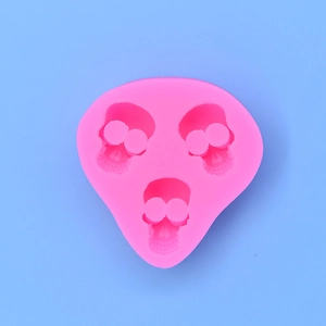 Pink silicone skull mold for DIY cake baking and Halloween chocolate making crafts