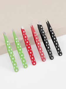 Detail of 6-piece polka dot eyebrow tweezers set with slanted and pointed tips