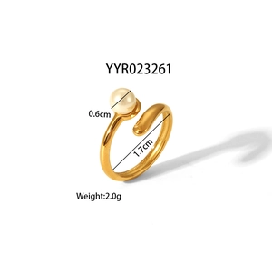 Detailed close-up of a gold titanium steel ring featuring a 6mm pearl on white background