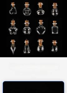 Detailed close-up of various mini glass jars set with cork stoppers for DIY crafts
