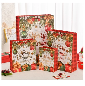 Detailed comparison of four sizes of red and green Christmas paper gift bags with gold foil