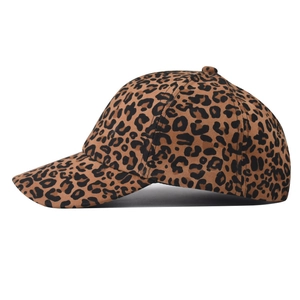 Detailed side view of a faux suede baseball cap with classic brown leopard print pattern