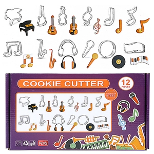 Macro view of 12-piece music themed stainless steel cookie cutters in retail packaging