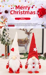 Detail of Christmas gnomes featuring knit hats with heart and star patterns in red and white