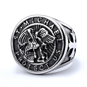 Vintage St. Michael stainless steel ring featuring detailed angel relief and engraving