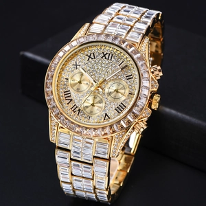 Macro shot of gold-plated watch featuring rainbow diamond bezel and iced-out Roman dial