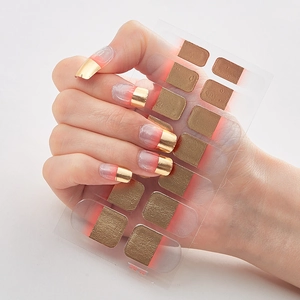 Macro view of gold French style nail stickers DQ-32 with metallic laser finish