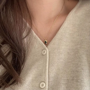 925 sterling silver gold necklace with vintage oval green gemstone pendant on model