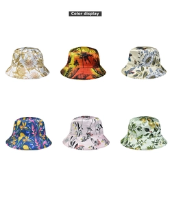 Detail display of silk-like bucket hats featuring diverse floral and tropical prints