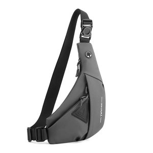 Detail of dark grey water-resistant chest bag with headphone port and brand logo