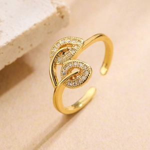 Detail of 18K gold-plated leaf-shaped open ring with micro-pave white zircon stones