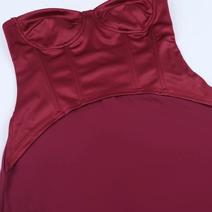 Detail view of burgundy satin bodice with corset boning and slim fit waist stitching