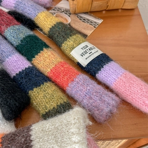 Rainbow striped knit scarf in vibrant wool blend with vintage fluffy texture