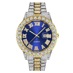 Macro detail of iced-out hip hop watch with blue dial and roman numerals date display