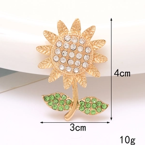 Detailed view of sunflower brooch with white and green rhinestones showing 4cm dimensions