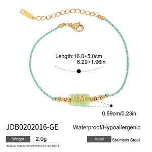 Detail of LOVE charm bracelet with size specs and waterproof stainless steel features