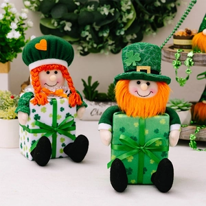 Detailed view of Saint Patrick's Day gnome doll with clover patterns and orange braids