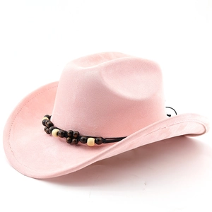 Macro shot of pink faux suede cowboy hat with ethnic wooden beaded band and fine stitching