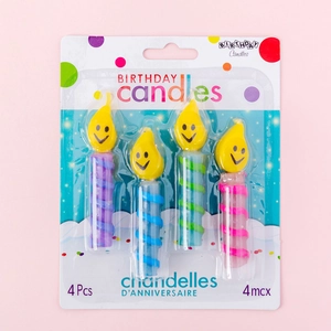 Set of 4 colorful spiral birthday candles with yellow smiley face flame tops on card