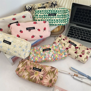 Floral corduroy pencil case and makeup organizer bag with diverse vintage flower patterns