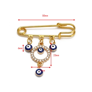 Detailed size specifications for the gold Hamsa hand brooch with blue evil eye charms