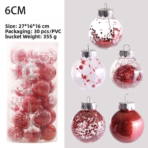Close-up of 6cm Christmas ball set with glitter and ribbon fillings in transparent PVC tube