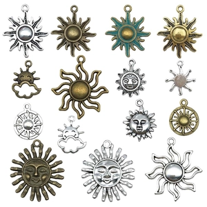 Set of 15 vintage metal sun pendants for jewelry making in silver and bronze finishes