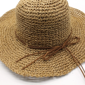 Classic woven straw sun hat with deep brown ribbon bow tie for women summer beach travel