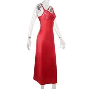 Detail of red satin dress with white lace neckline and glossy silk texture