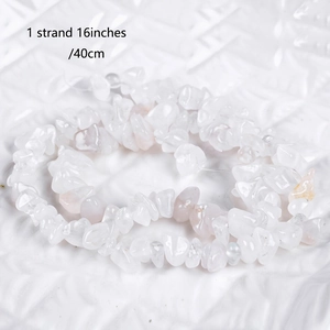 Macro shot of 1 strand of 16-inch natural clear crystal beads for tree of life jewelry