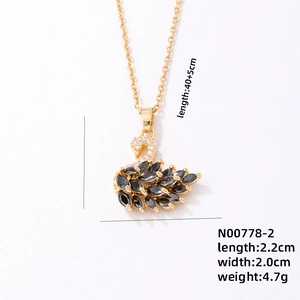 Detailed view of swan pendant with black marquise stones and dimensions labels
