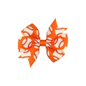 Orange grosgrain ribbon hair bow with white baseball print and layered windmill knot