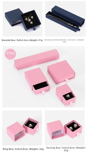 Detailed drawer-style jewelry boxes for necklaces and rings in blue and pink matte finish