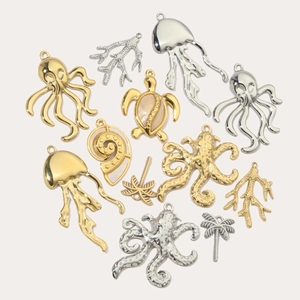 Marine life themed gold and silver ocean charms including octopus and jellyfish shapes