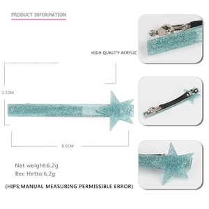 Detail view of 8.5cm teal glitter star hair clip with material and size specifications