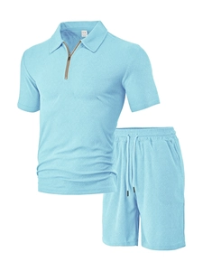 Close-up of the light blue towel jacquard fabric and neck label on men's polo set