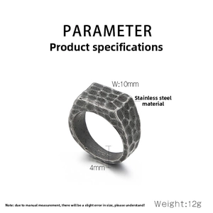 Macro detail of men's vintage hammered stainless steel signet ring showing 10mm width